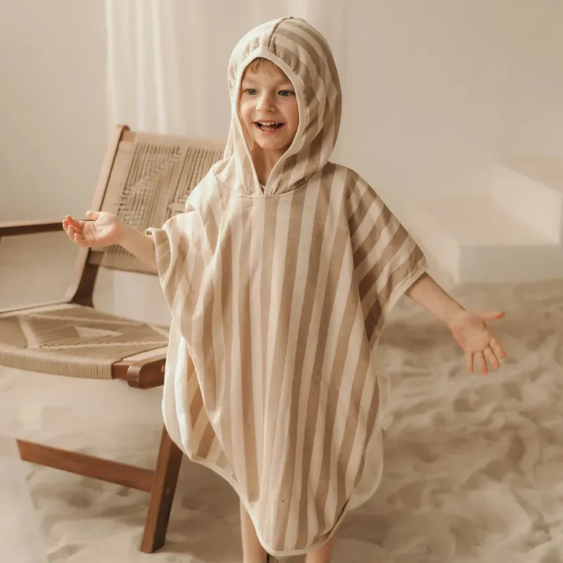 Mrs Ertha barnponcho Blush Toffee Lines Nedsatt pris
