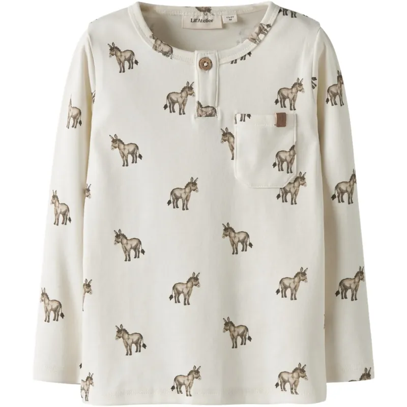 Lil‘Atelier Coconut Milk Donky Nmmlayo Sio Ls Slim Topp Lil Rabatter